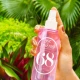 Hand holding a 240ml bottle of Sol De Janeiro Cheirosa 68 Perfume Mist Hand holding a 240ml bottle of Sol De Janeiro Cheirosa 68 Perfume Mist