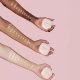 Outtretched arms showing wide range of shades in Sculpted By Aimee Connolly Cream Cushion Foundation 